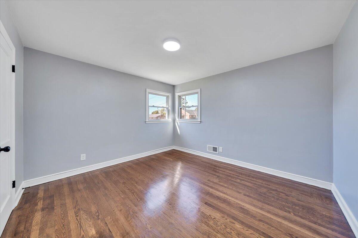 210 Post Road Roanoke, VA 24019 - Photo 12 of 56 a view of empty room with wooden floor and fan