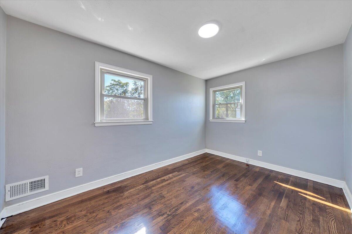 210 Post Road Roanoke, VA 24019 - Photo 14 of 56 a view of room with hardwood floor and window