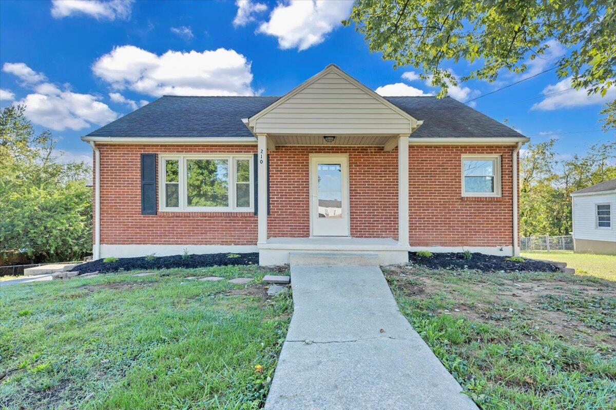 210 Post Road Roanoke, VA 24019 - Photo 2 of 56 a front view of a house with garden