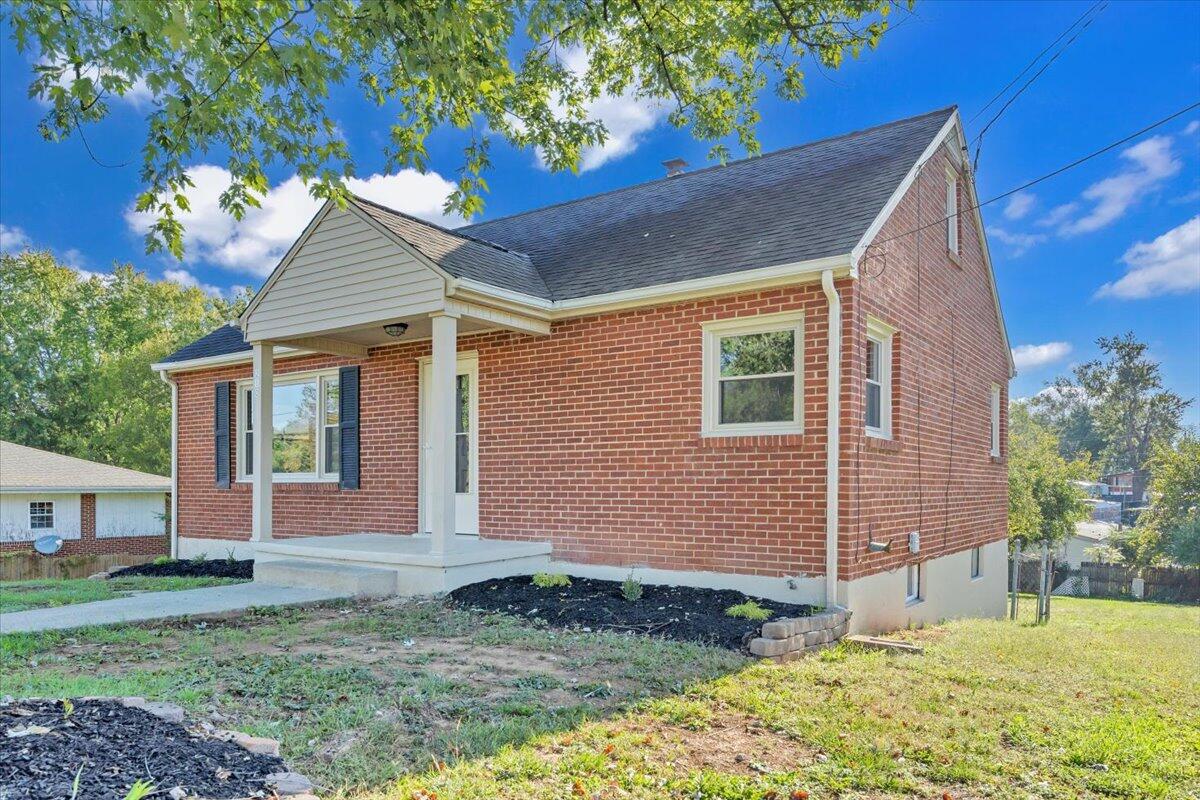 210 Post Road Roanoke, VA 24019 - Photo 34 of 56 a view of a house with a yard
