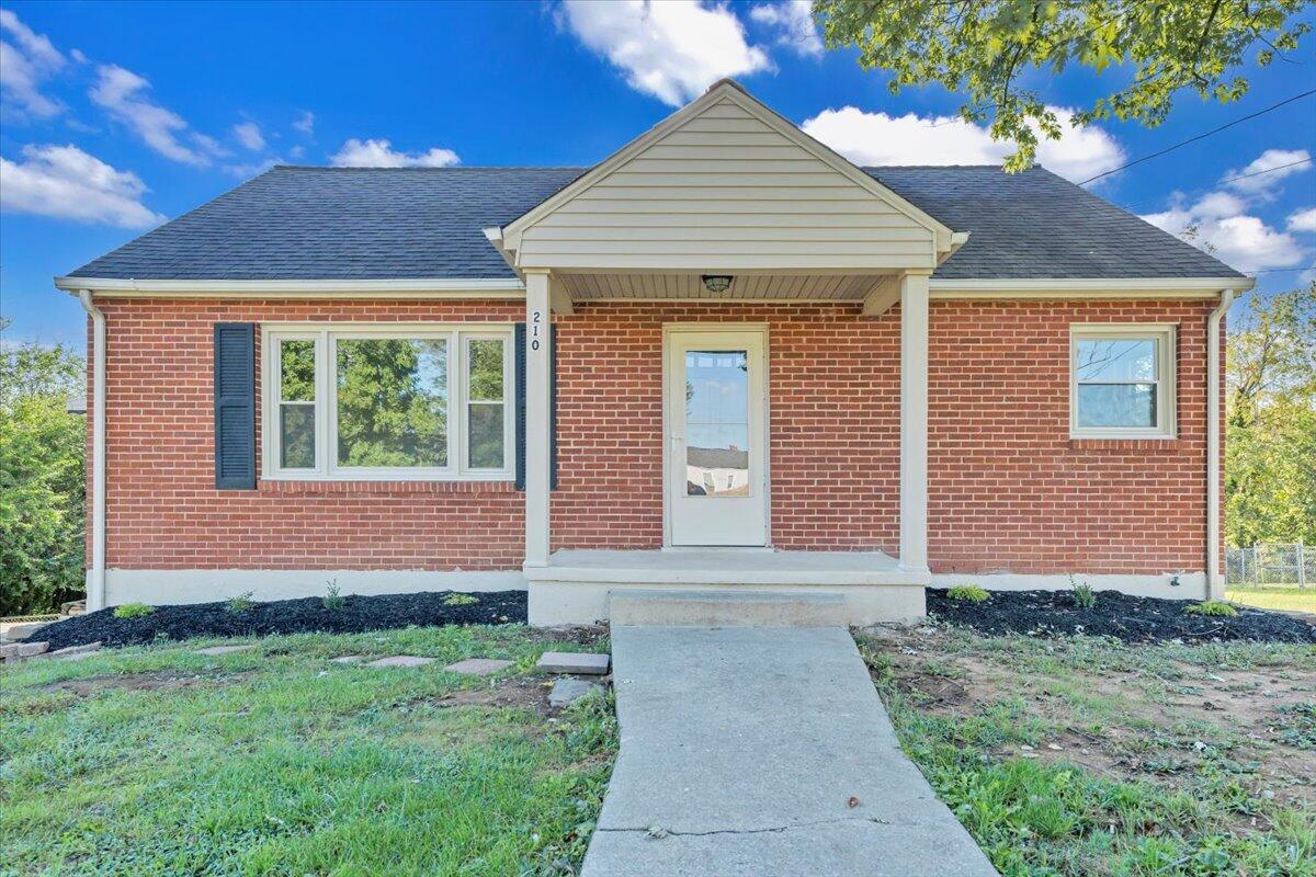 210 Post Road Roanoke, VA 24019 - Photo 36 of 56 a front view of a house with garden