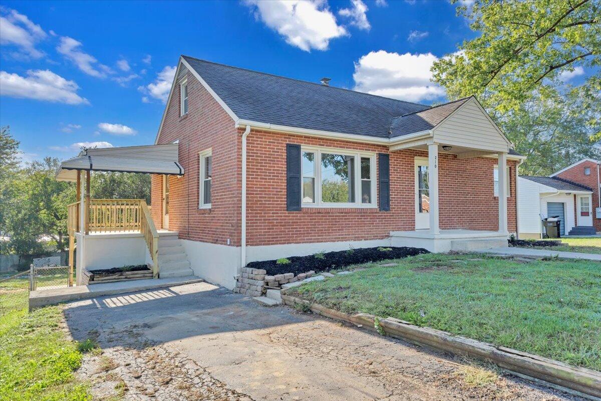 210 Post Road Roanoke, VA 24019 - Photo 38 of 56 a front view of a house with a yard