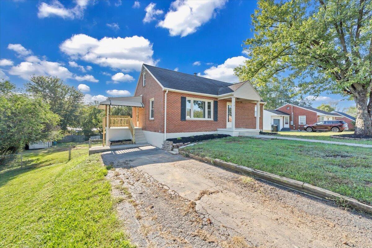 210 Post Road Roanoke, VA 24019 - Photo 39 of 56 a view of a house with a big yard and large tree