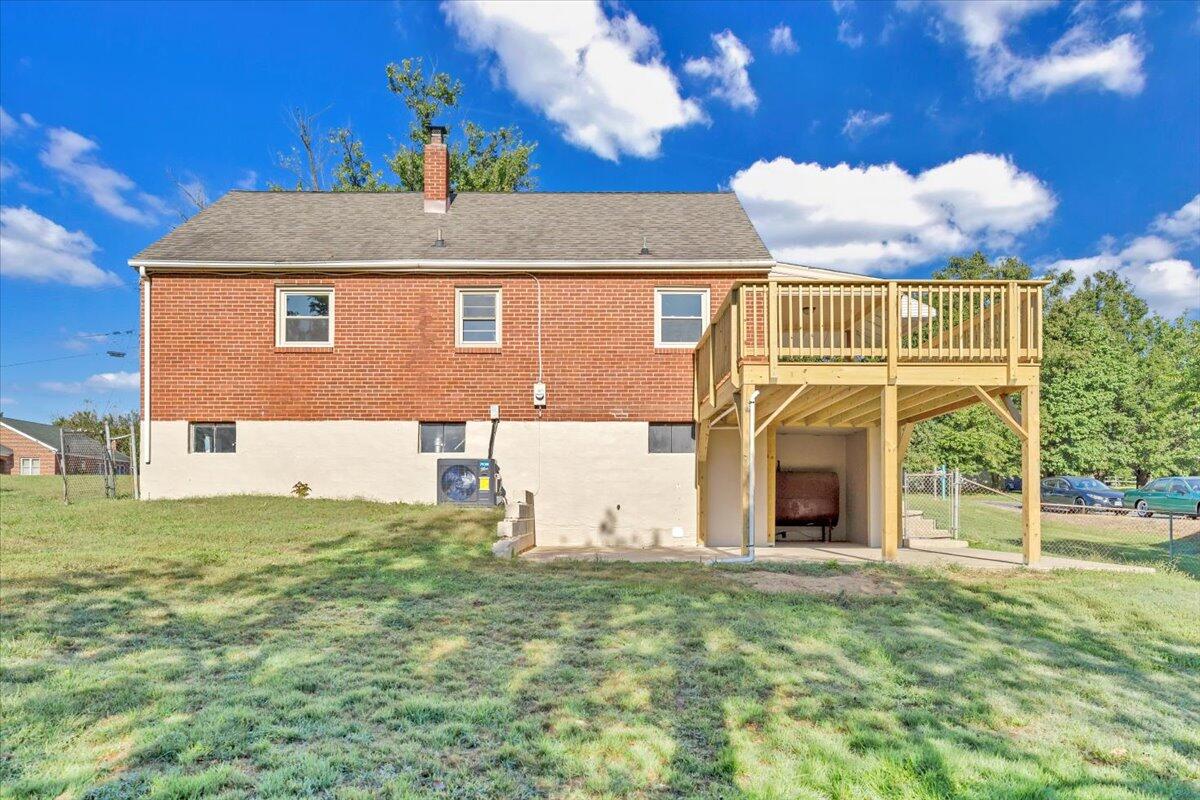 210 Post Road Roanoke, VA 24019 - Photo 46 of 56 a view of a house with a yard
