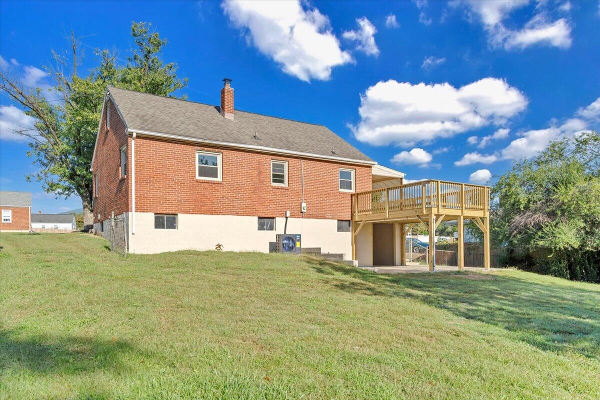 210 Post Road Roanoke, VA 24019 - Photo 48 of 56 a front view of a house with a yard