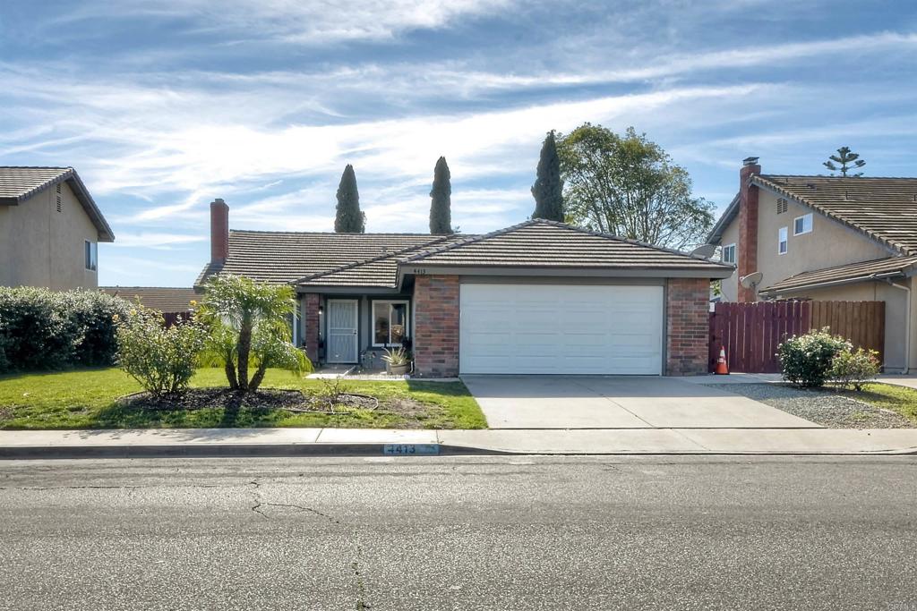 4413 Point Degada Oceanside, CA 92058 - Photo 31 of 46 front view of house with a yard