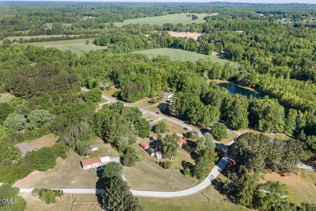 454 Cedar Creek Road Timberlake, NC 27583 - Photo 35 of 39 an aerial view of a house with a yard