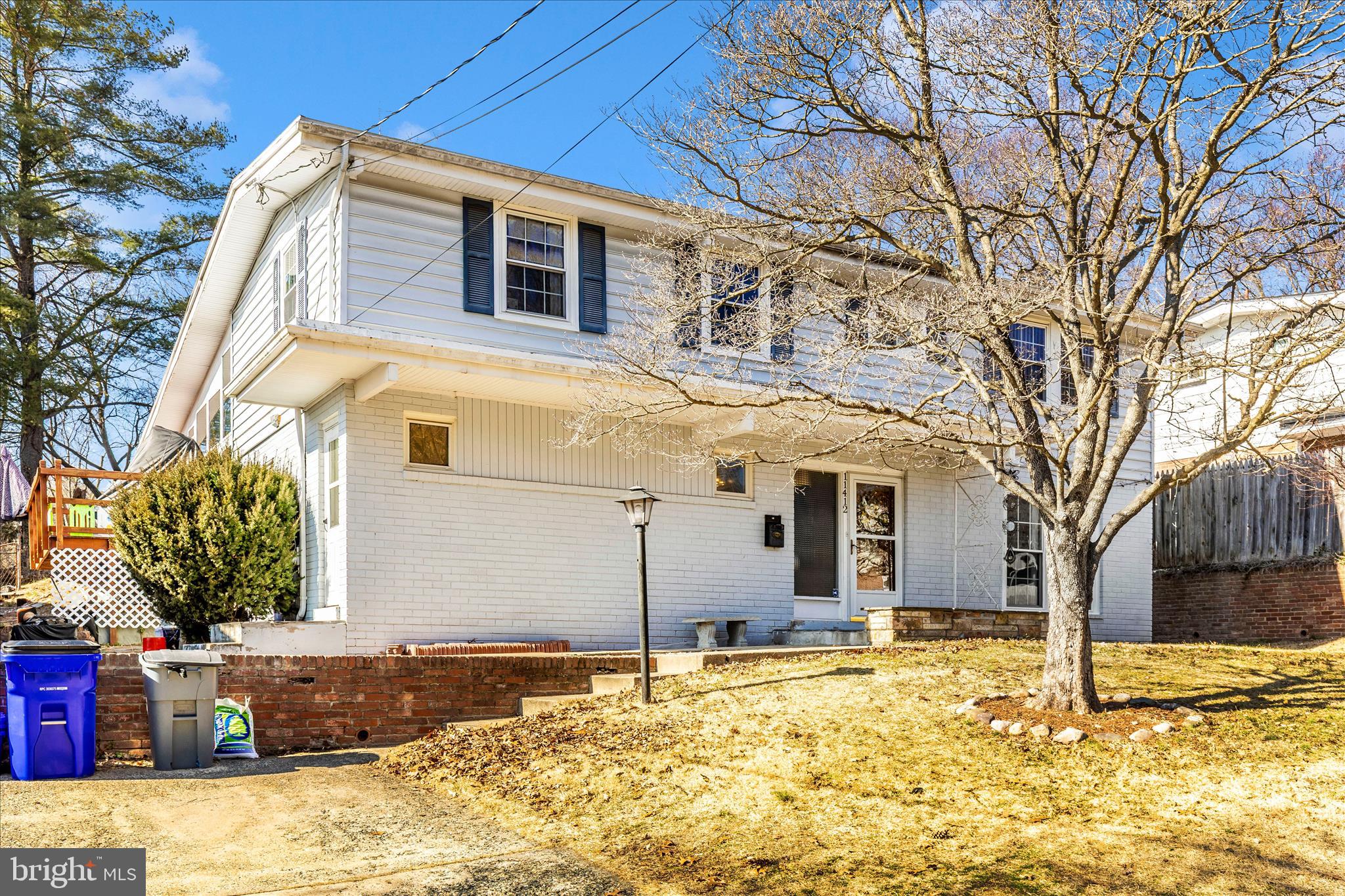 11412 Fairoak Drive Silver Spring, MD 20902 - Photo 3 of 48 a front view of a house with a yard