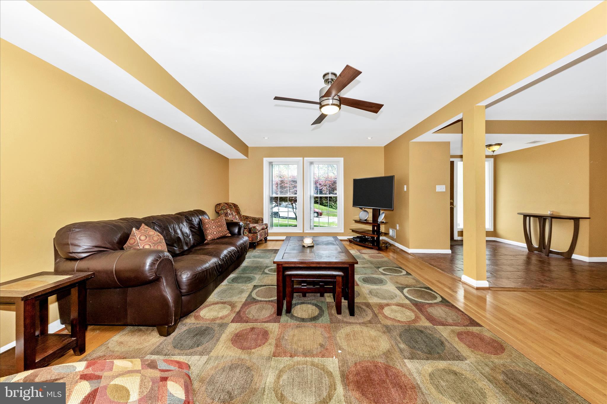 11412 Fairoak Drive Silver Spring, MD 20902 - Photo 7 of 48 a living room with furniture and a wooden floor