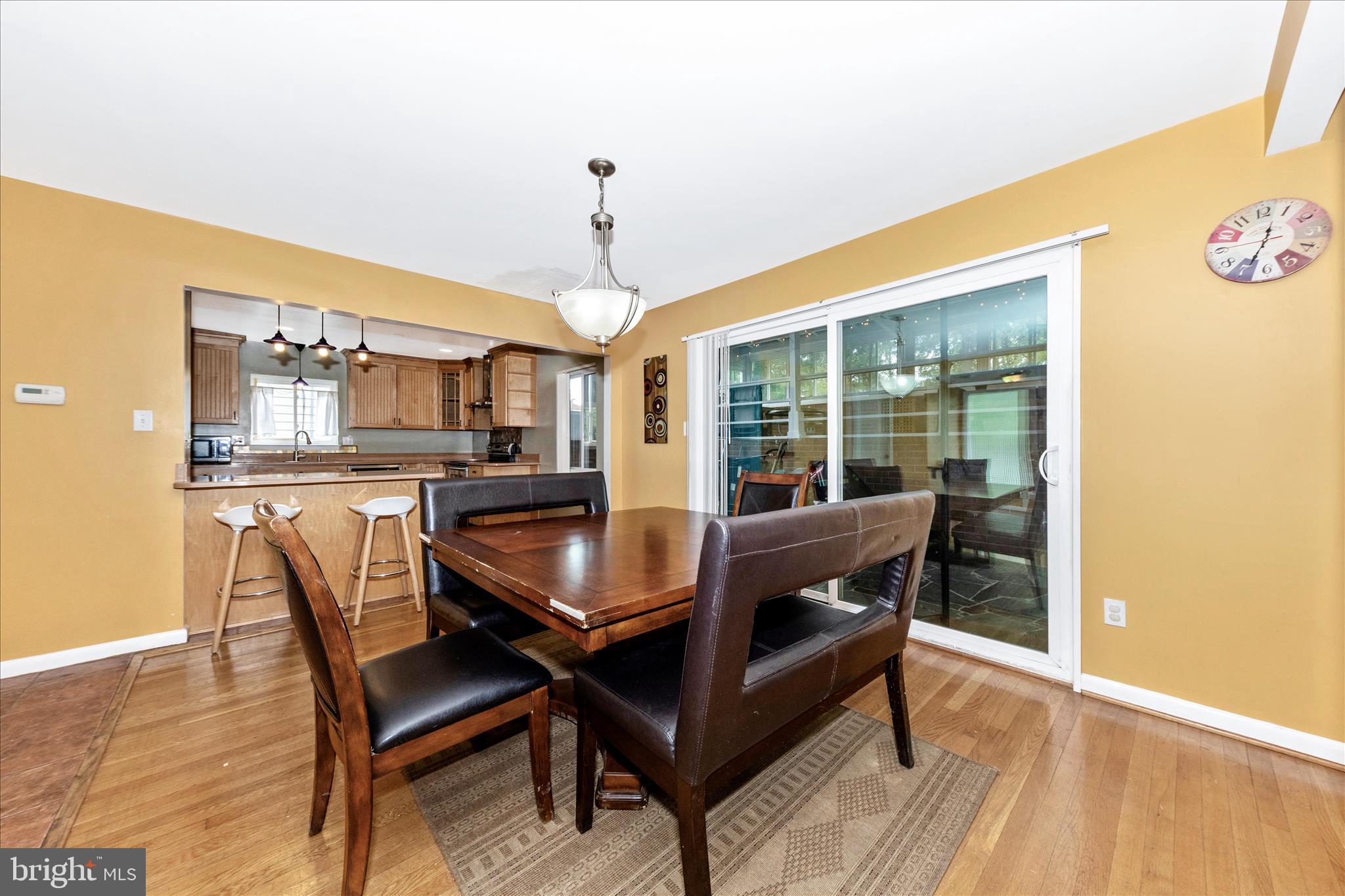 11412 Fairoak Drive Silver Spring, MD 20902 - Photo 9 of 48 a dining room with furniture and wooden floor