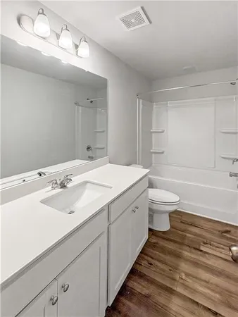 a bathroom with a sink and a bathtub