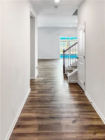 a view of entryway with wooden floor