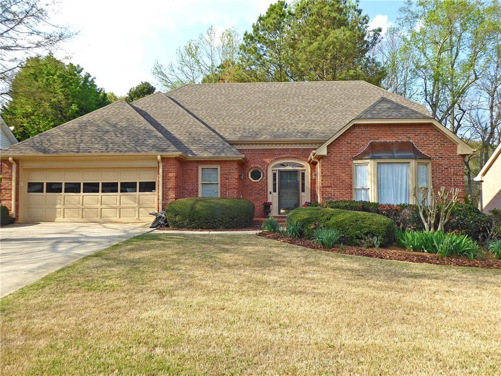 280 Stepping Stone Drive Alpharetta, GA 30004 - Photo 1 of 1 a front view of a house with a yard