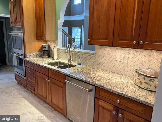 2601 Mill Race Road Frederick, MD 21701 - Photo 13 of 42 a kitchen with granite countertop a sink and cabinets