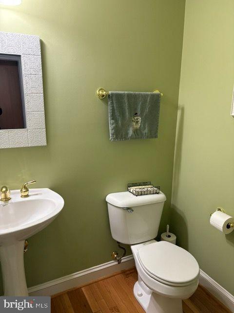 2601 Mill Race Road Frederick, MD 21701 - Photo 15 of 42 a bathroom with a toilet a sink and mirror