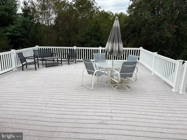 a view of backyard with green space