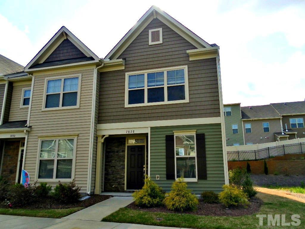 7828 Allscott Way Raleigh, NC 27612 - Photo 1 of 17 a front view of a house with garden