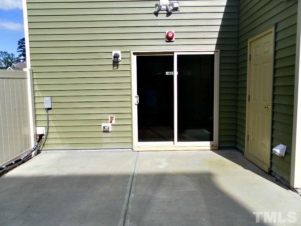 7828 Allscott Way Raleigh, NC 27612 - Photo 4 of 17 a view of a door of a house