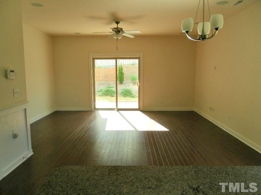 7828 Allscott Way Raleigh, NC 27612 - Photo 10 of 17 wooden floor in an empty room