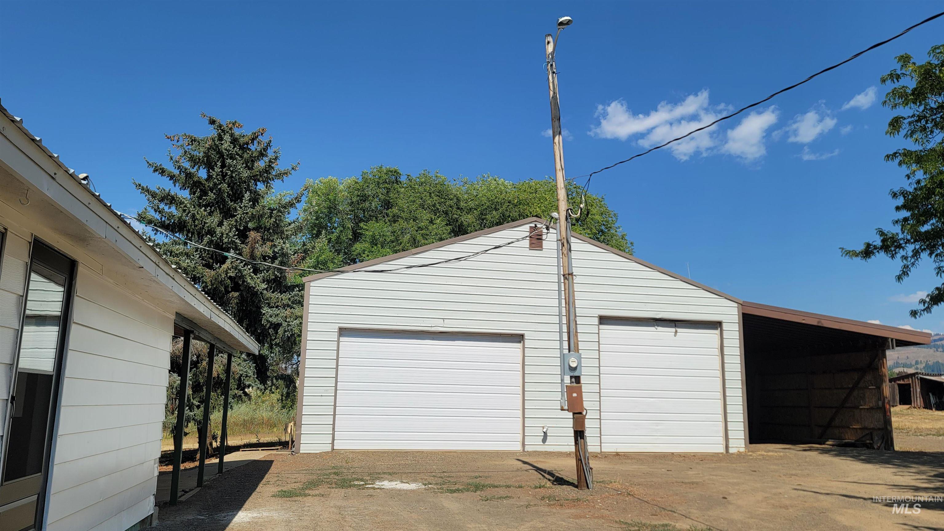 2122 Highway 95 Council, ID 83612 - Photo 24 of 31 Garage featuring a garage