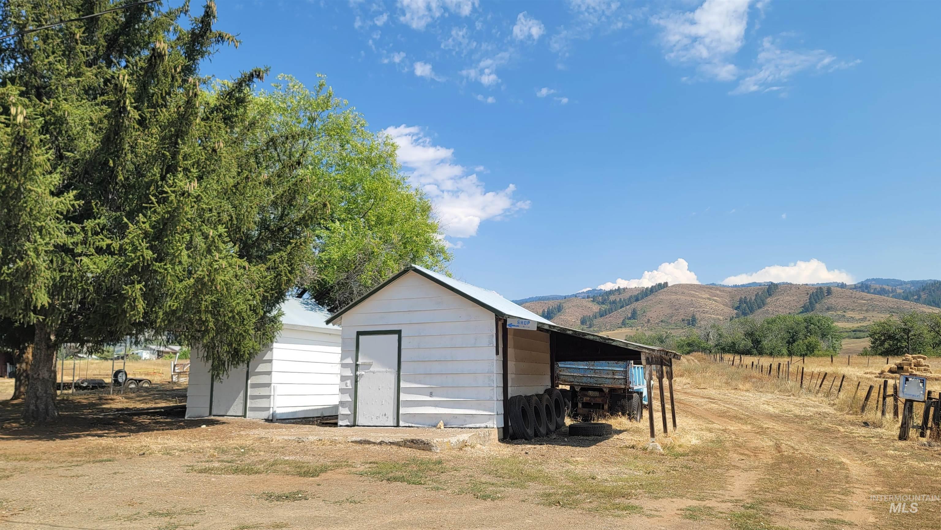 2122 Highway 95 Council, ID 83612 - Photo 26 of 31 View of shed featuring a carport, a rural view, and a mountain view