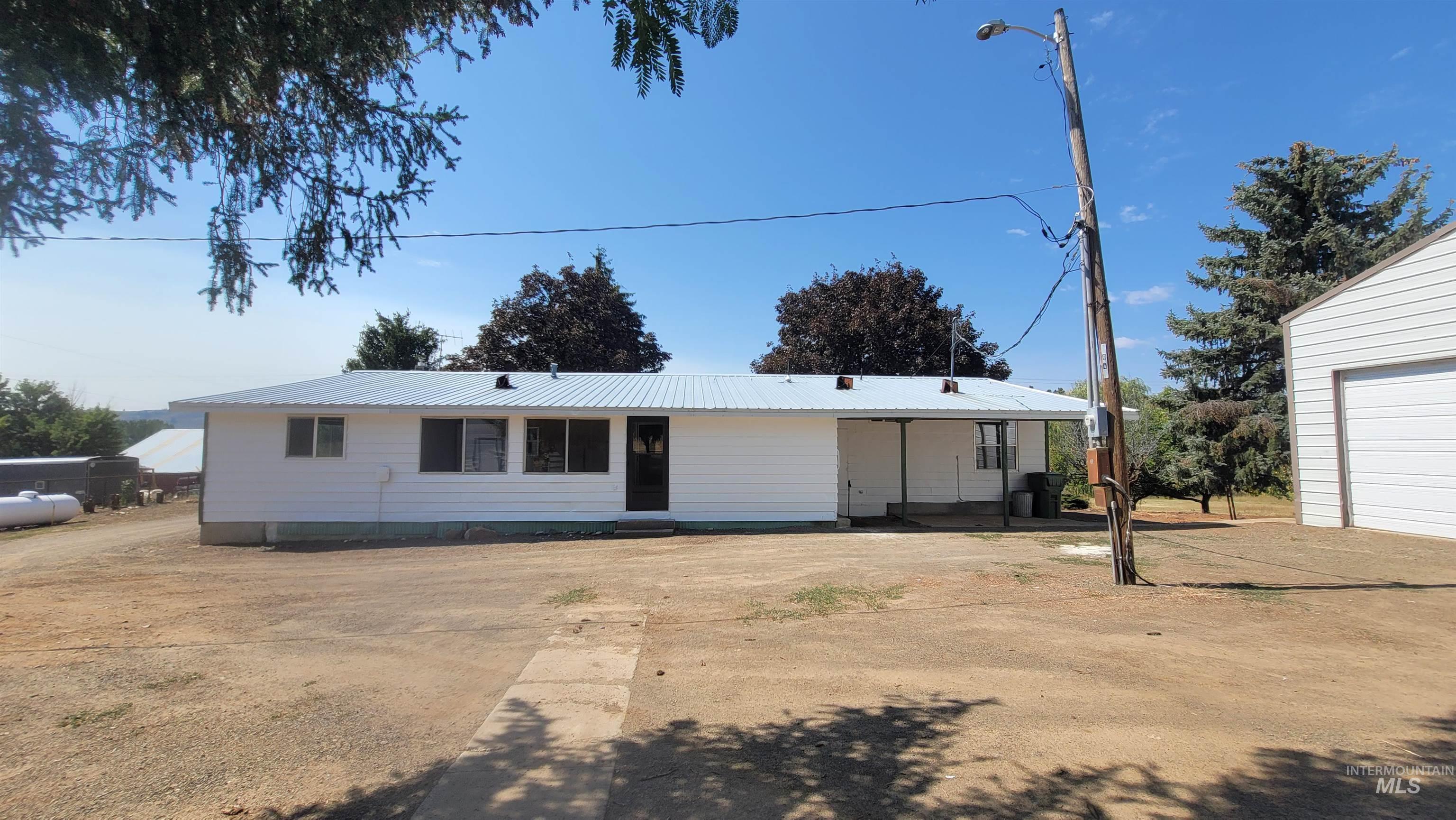 2122 Highway 95 Council, ID 83612 - Photo 4 of 31 View of front of home featuring a metal roof