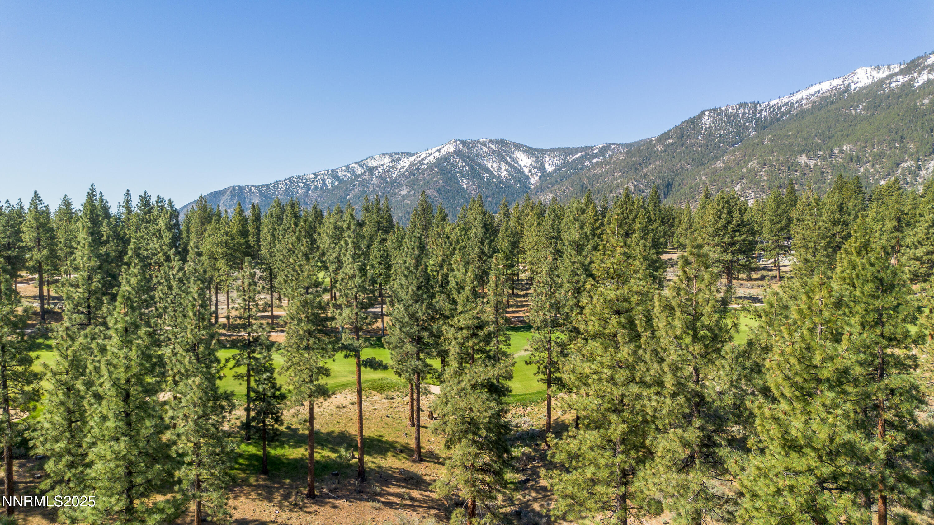 249 Redding Way, Unit 225 Carson City, NV 89705 - Photo 11 of 28 a view of a house with a mountain in the background