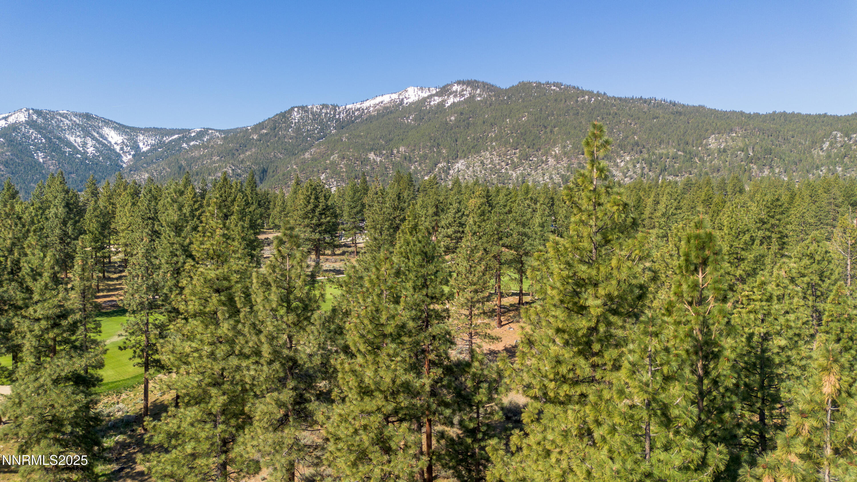 249 Redding Way, Unit 225 Carson City, NV 89705 - Photo 10 of 28 a view of a mountain range in a cloudy sky
