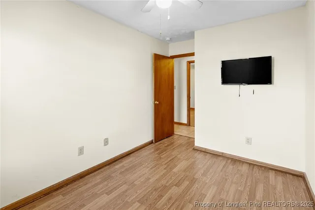 a view of a porch with a table and chairs and floor