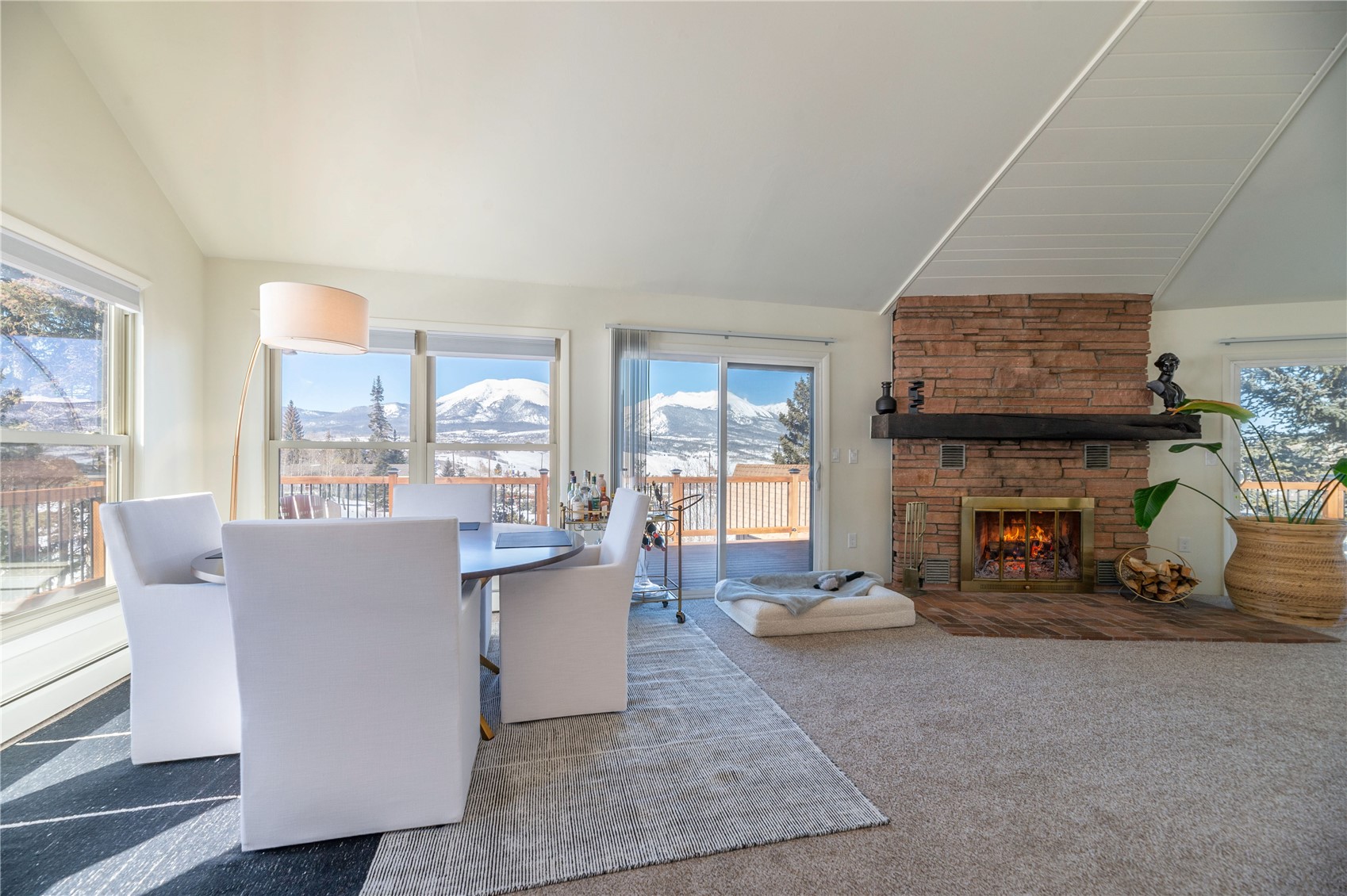 340 Buffalo Street Dillon, CO 80435 - Photo 14 of 40 a living room with fireplace furniture and a large window