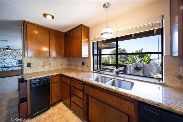 a view of livingroom with kitchen view and living room