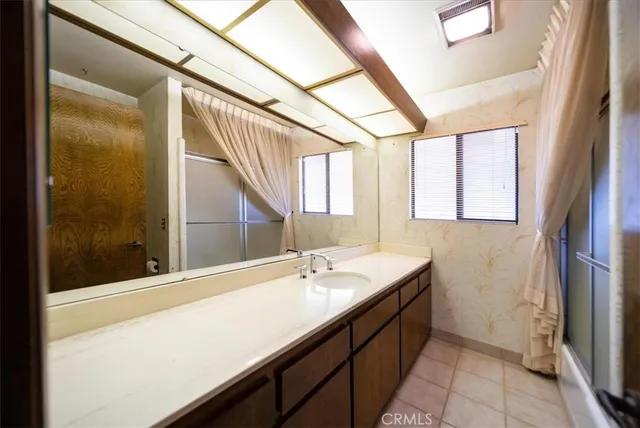 a view of a room that has a window in it