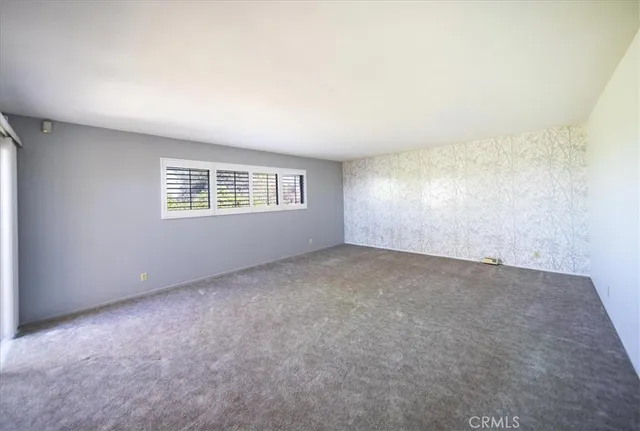 a bathroom with a sink toilet double vanity and shower