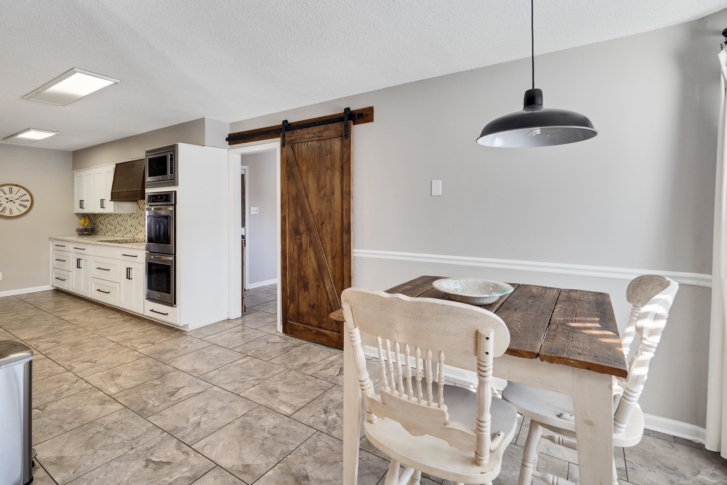 3888 Appling Road Bartlett, TN 38135 - Photo 13 of 21 a dining room with furniture and entryway