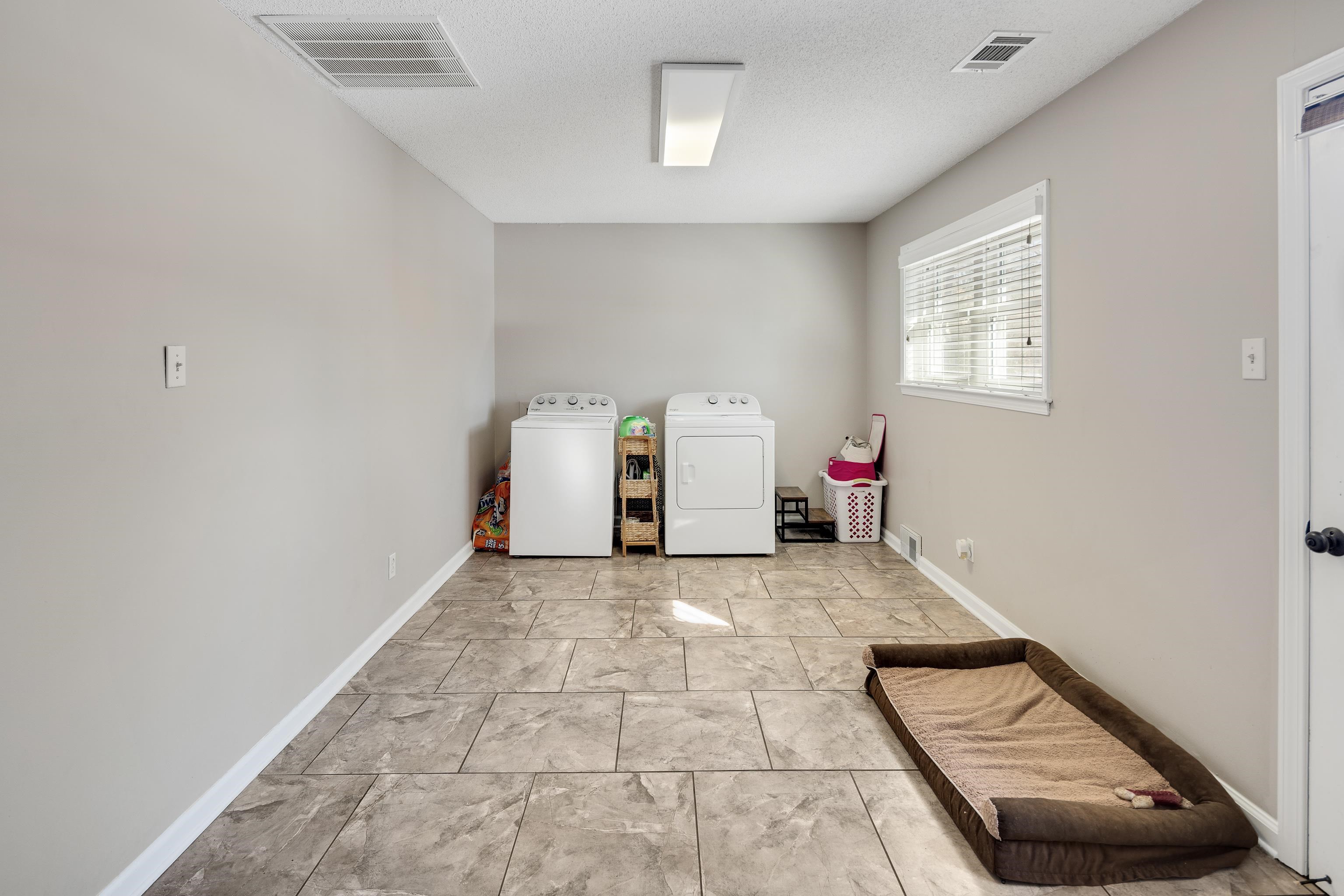 3888 Appling Road Bartlett, TN 38135 - Photo 14 of 21 a view of a livingroom with wooden floor and furniture