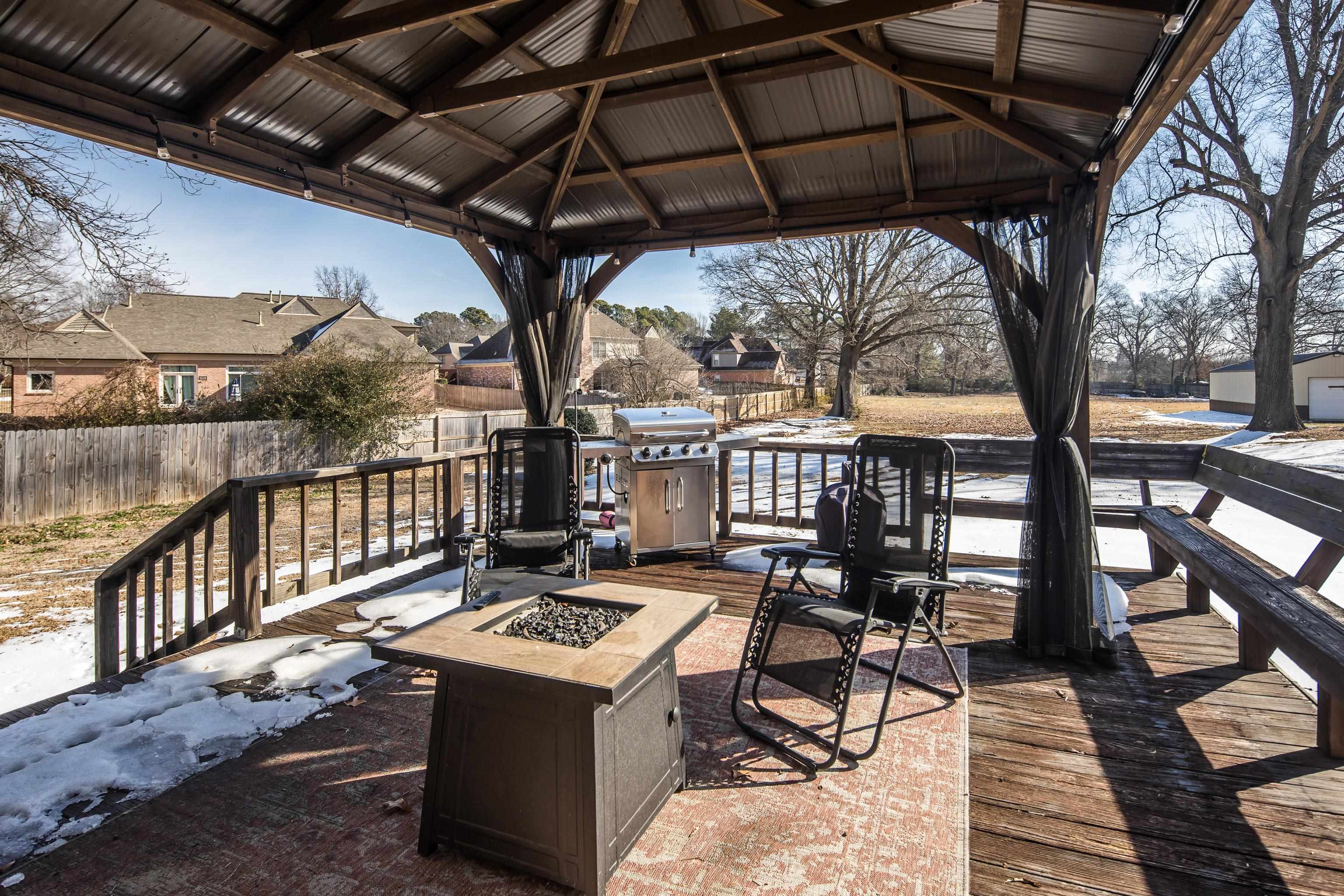 3888 Appling Road Bartlett, TN 38135 - Photo 19 of 21 a view of balcony with wooden floor and outdoor seating