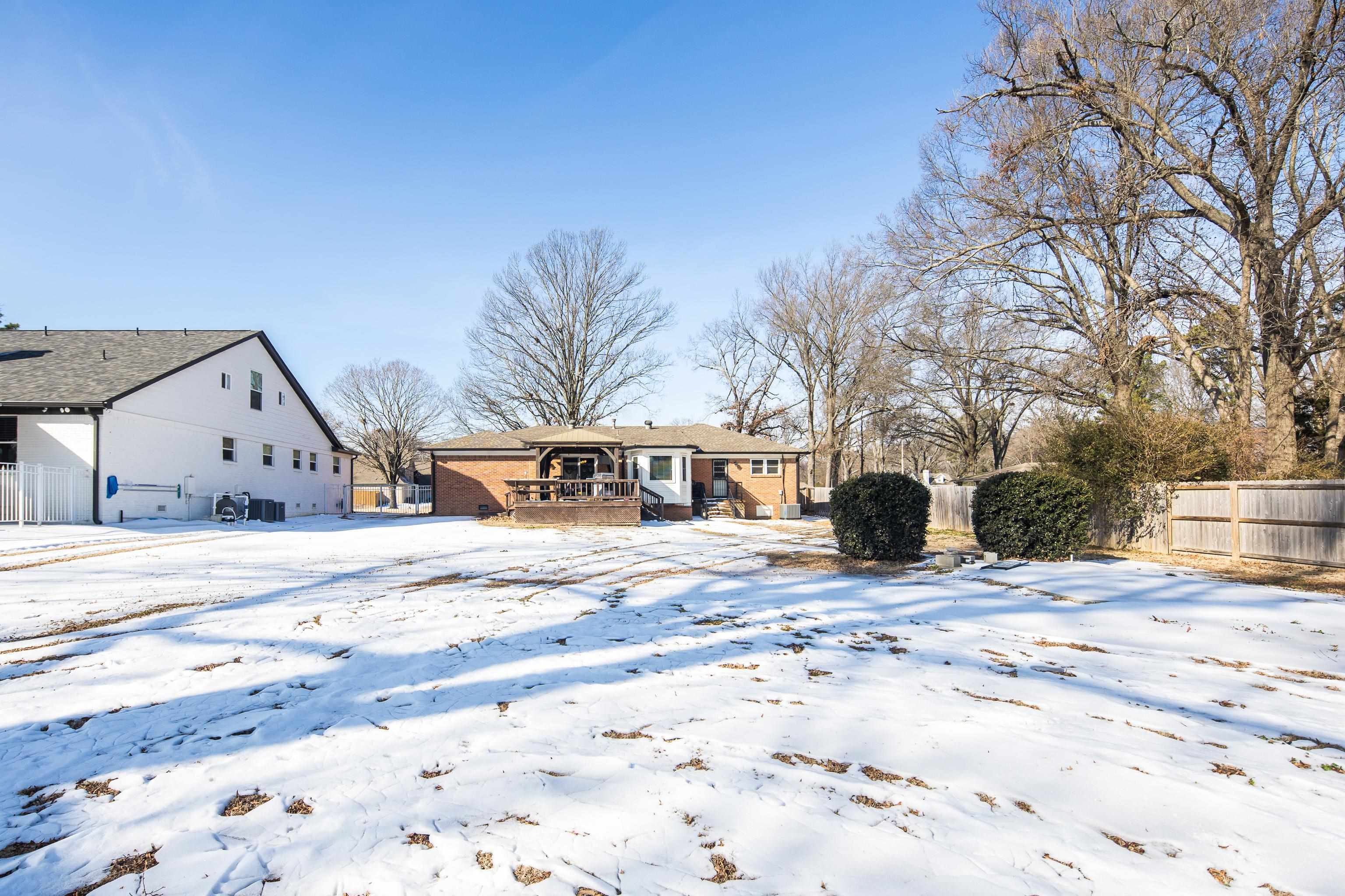 3888 Appling Road Bartlett, TN 38135 - Photo 20 of 21 a view of a house with snow on the road