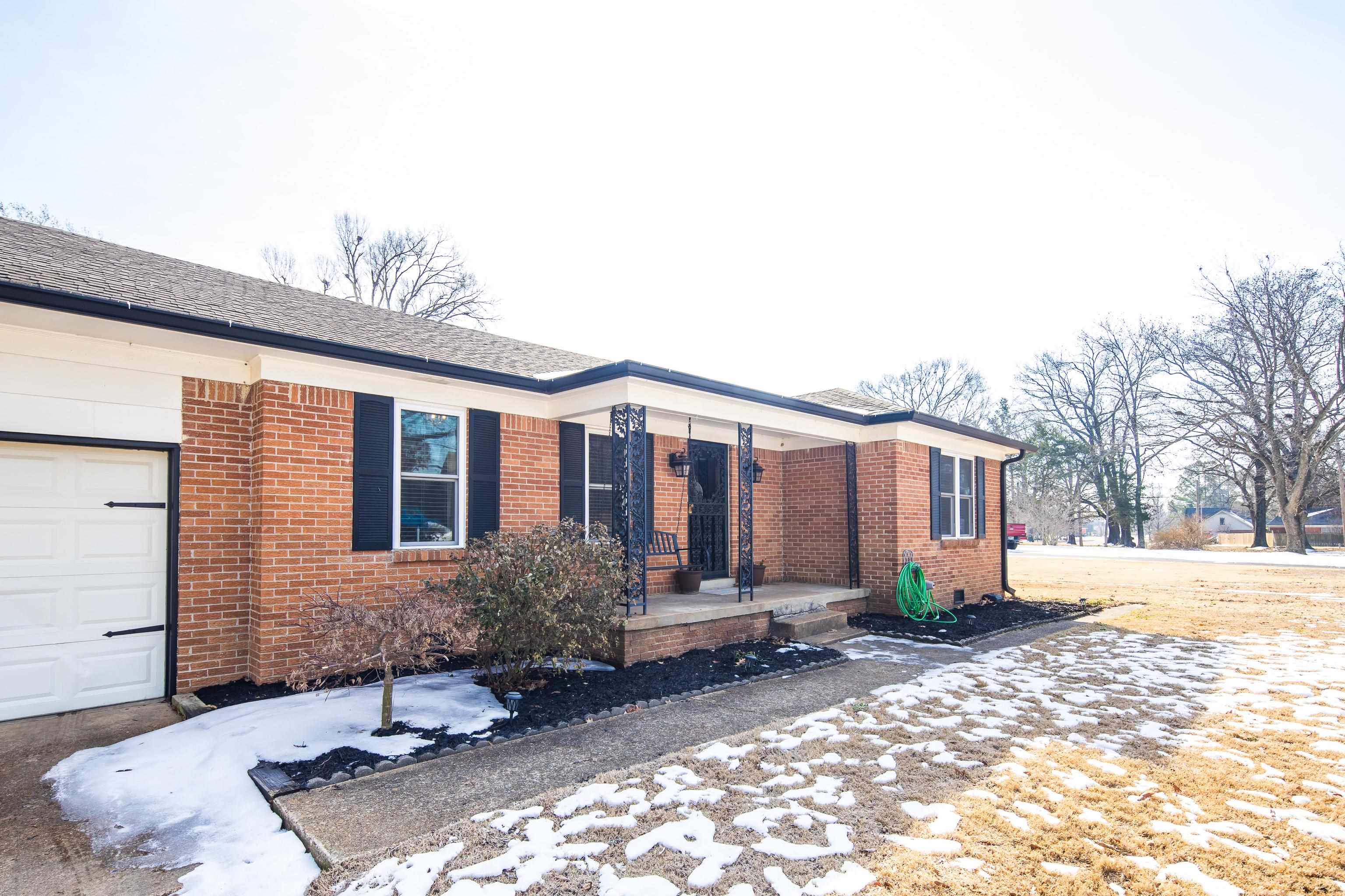 3888 Appling Road Bartlett, TN 38135 - Photo 3 of 21 a front view of a house with garden