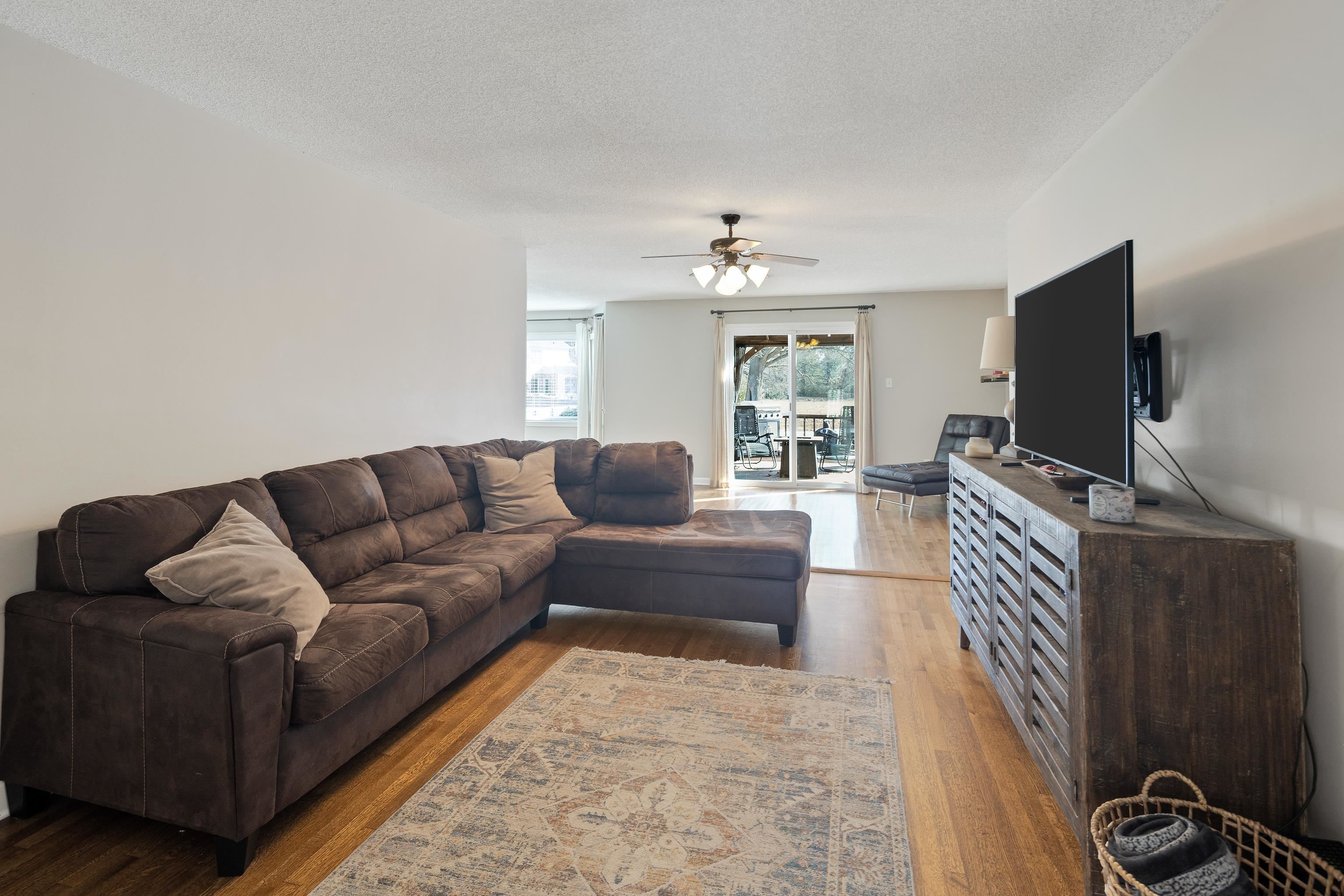 3888 Appling Road Bartlett, TN 38135 - Photo 7 of 21 a living room with furniture and a flat screen tv
