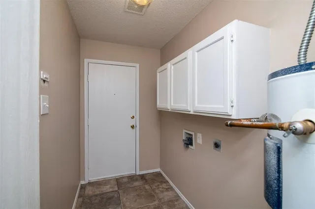 a view of cabinets with sink