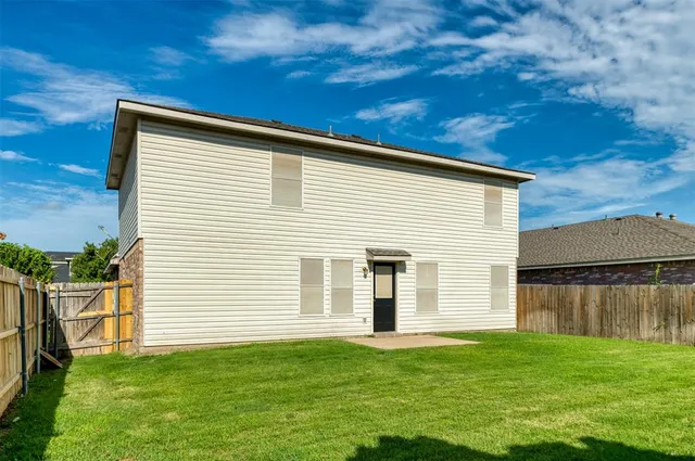 a view of a backyard with a garden
