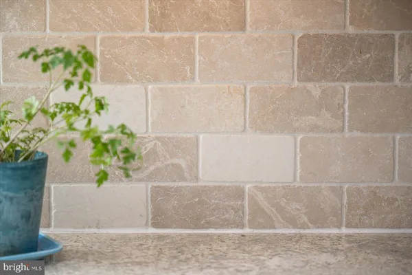 a spacious bedroom with a bed and a television