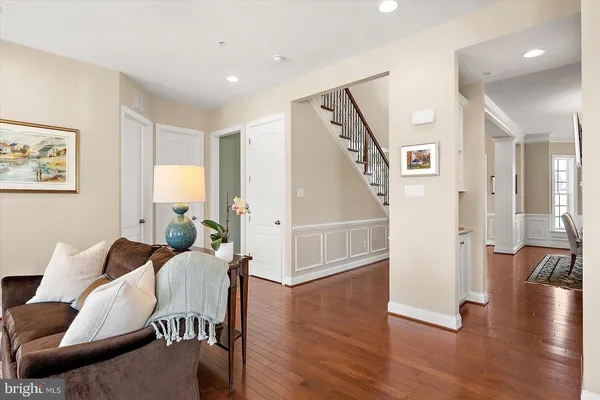 a view of walk in closet with clothes
