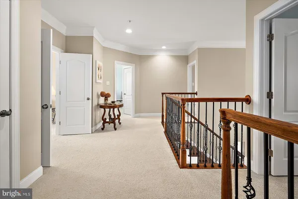 a bed room with a bed and a chair