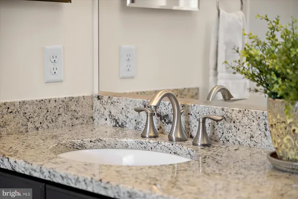 a aerial view of a house with swimming pool garden and patio