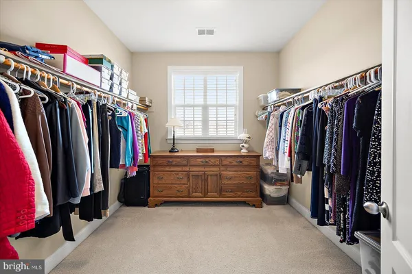 a view of deck with seating space and wooden floor