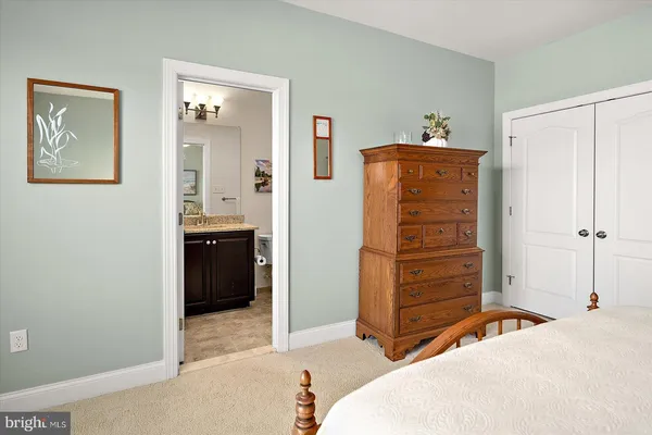 a view of a house with backyard porch and sitting area