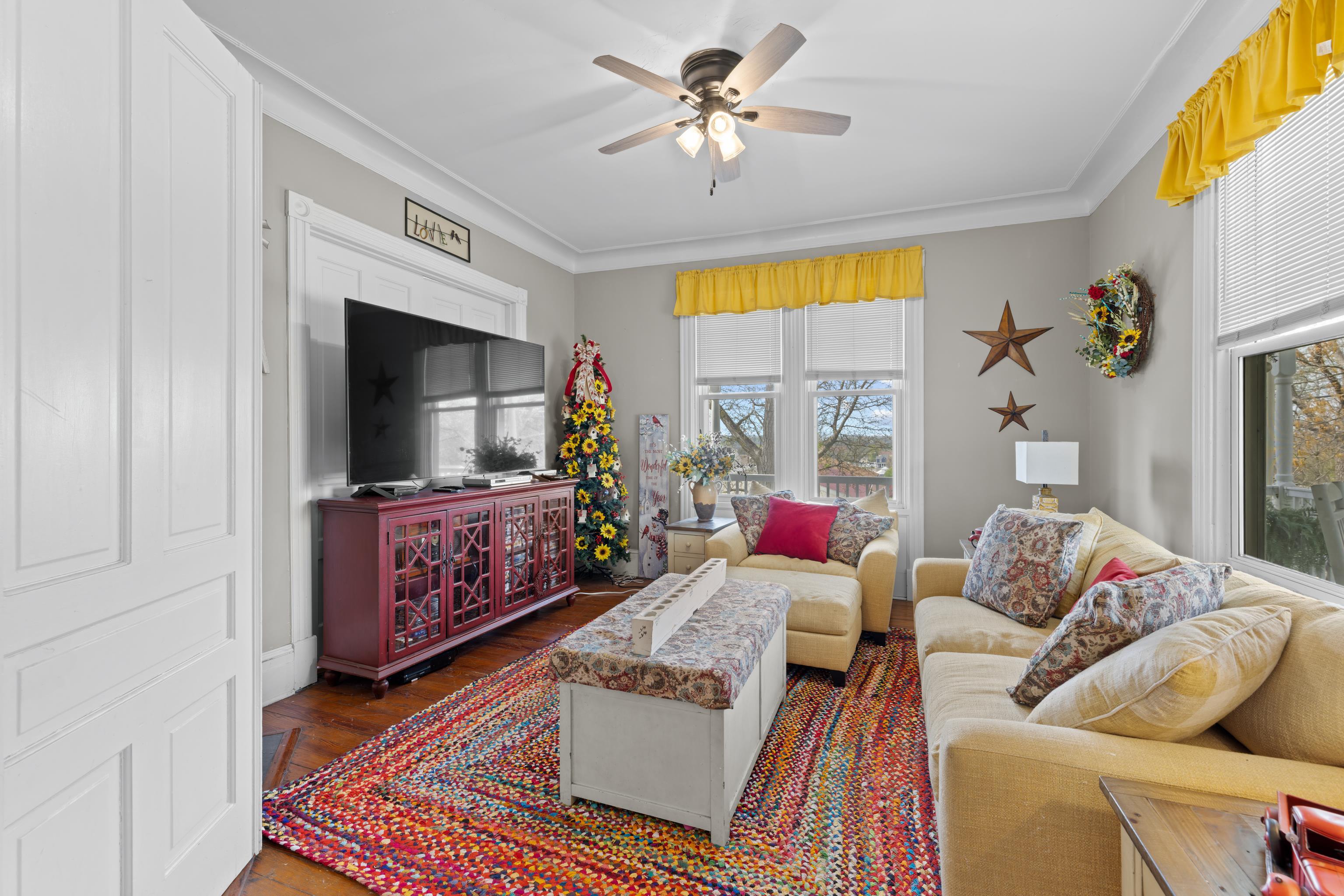 1224 4th Street Waynesboro, VA 22980 - Photo 13 of 75 a living room with furniture and a flat screen tv