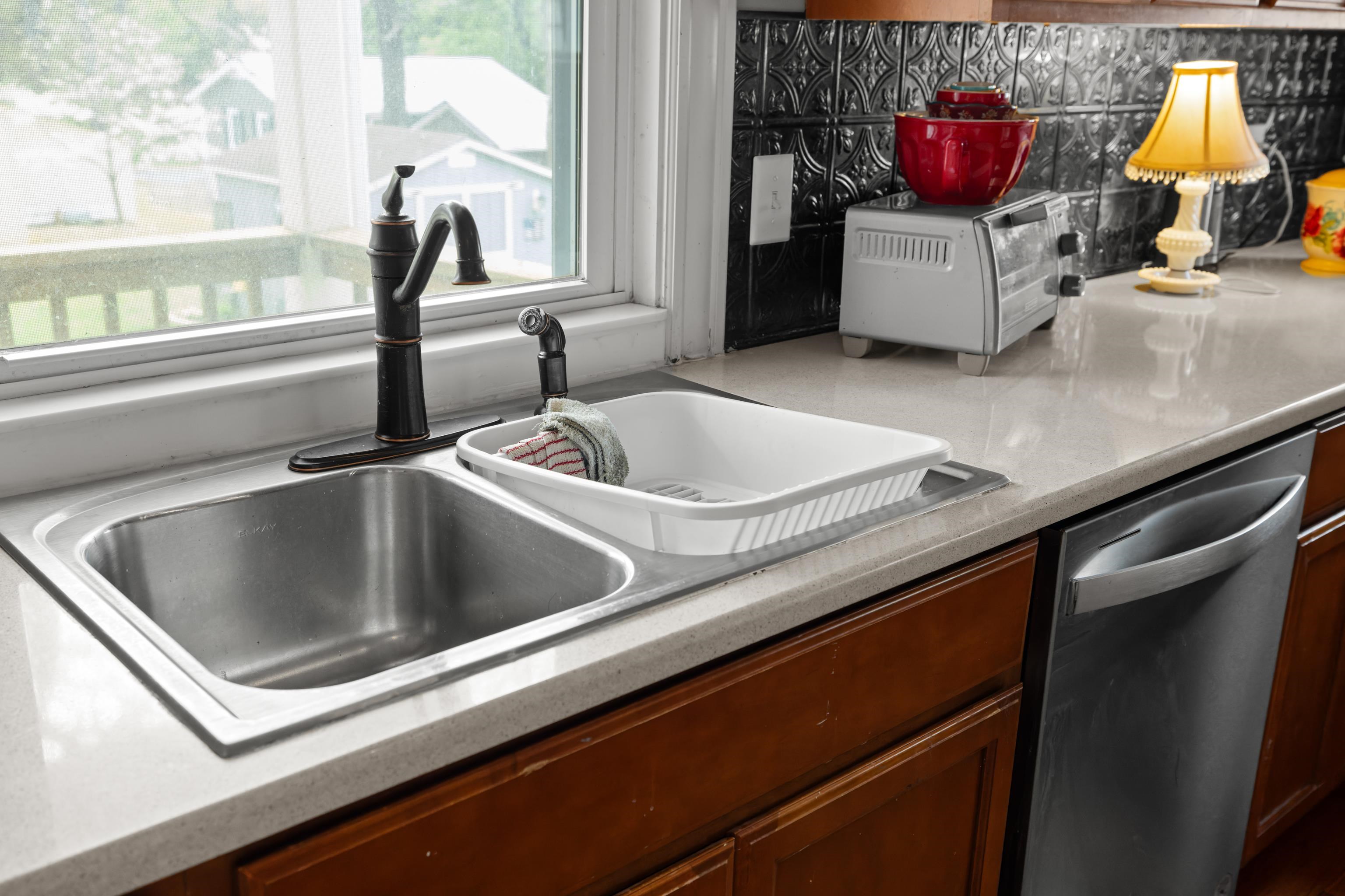 1224 4th Street Waynesboro, VA 22980 - Photo 24 of 75 a kitchen with a stove and a sink