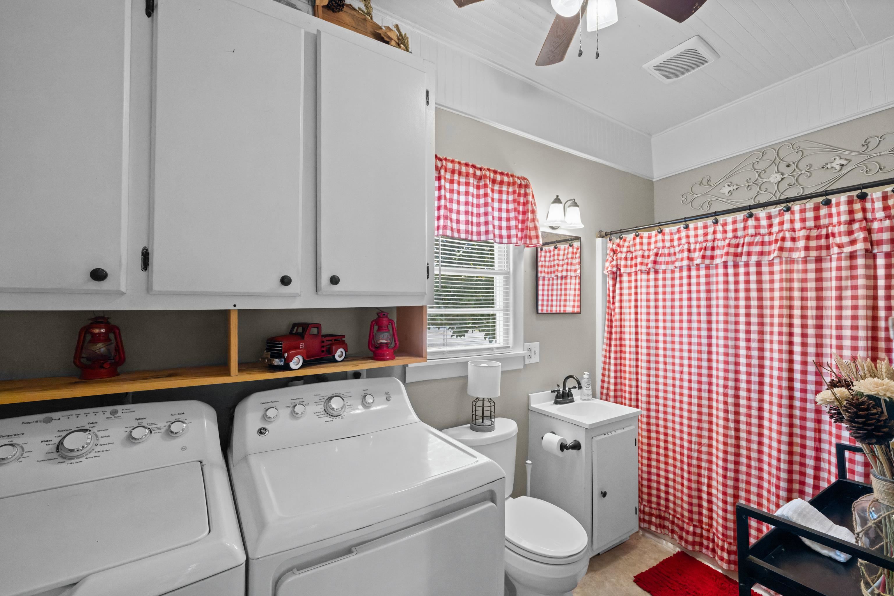 1224 4th Street Waynesboro, VA 22980 - Photo 34 of 75 a bathroom with a sink toilet vanity and window